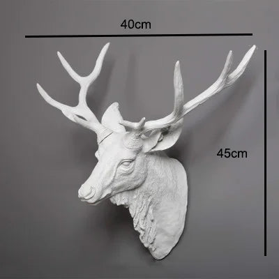 White deer head sculpture with measurements on a gray background