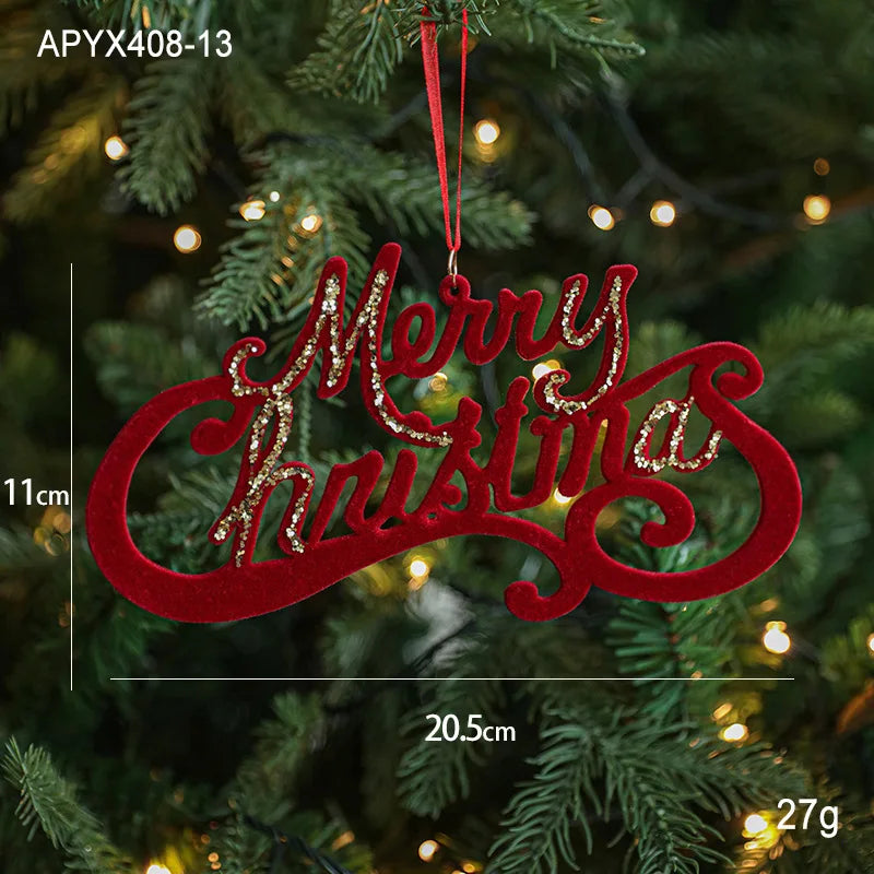 Red 'Merry Christmas' ornament hanging on a decorated Christmas tree with measurements displayed.