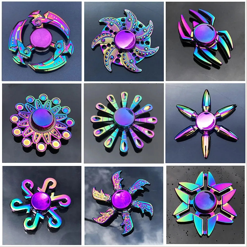 Grid of colorful fidget spinner designs on a dark background