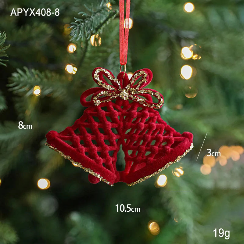 Red bell-shaped ornament with gold accents on a Christmas tree, showing measurements.