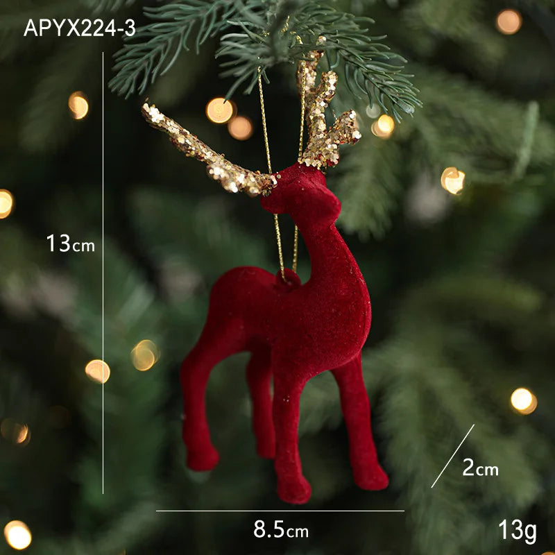 Red deer ornament with gold antlers on a Christmas tree, showing measurements.