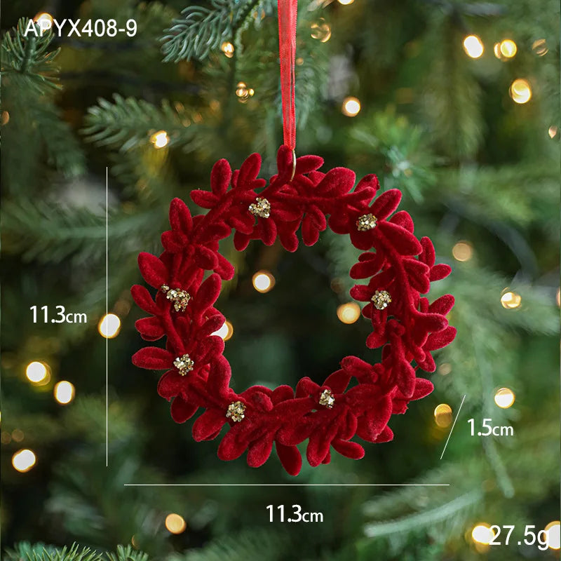Red decorative wreath ornament on a Christmas tree with measurements and weight displayed.