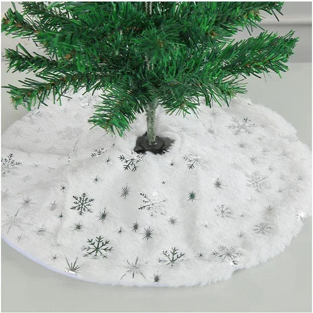 White faux fur tree skirt for a small Christmas Tree