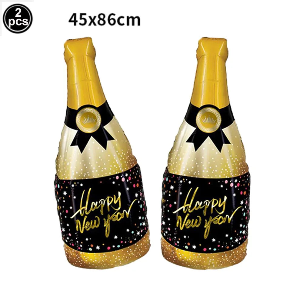 Two inflatable champagne bottle-shaped balloons with 'Happy New Year' text on a white background.