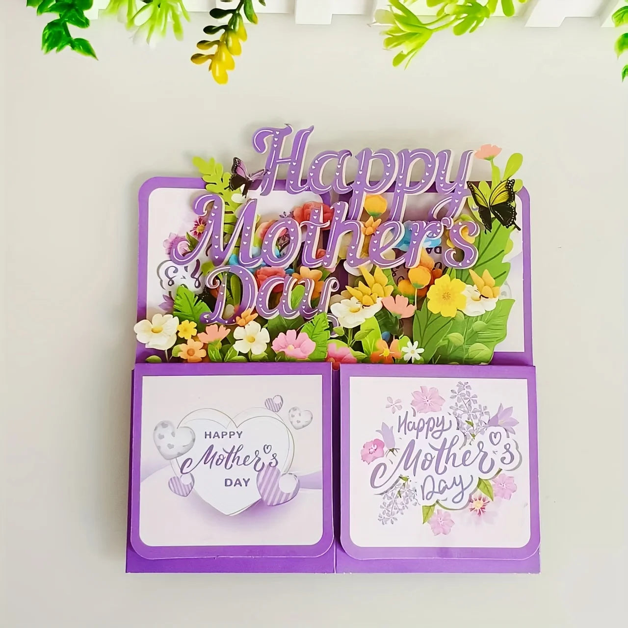 Mother's Day card with floral design and 'Happy Mother's Day' text on a white background.