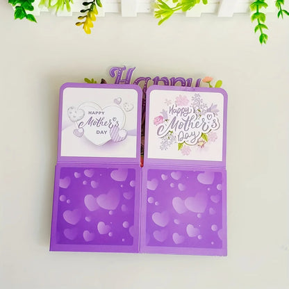 Open purple card with 'Happy Mother's Day' text and heart patterns on a light background.