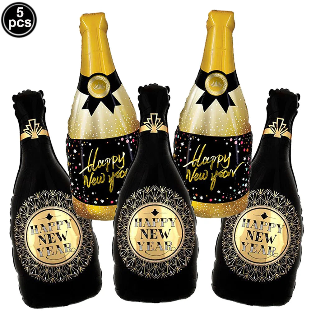 Five inflatable champagne bottles with 'Happy New Year' labels on a white background
