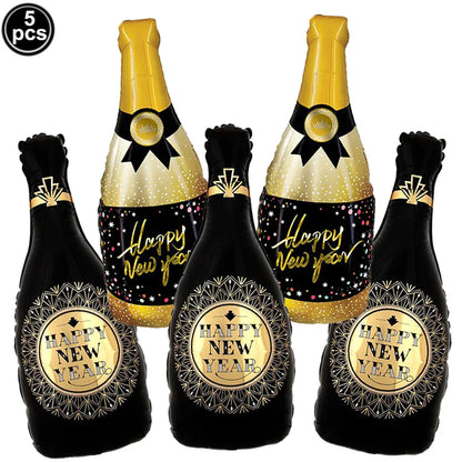 Five inflatable champagne bottles with 'Happy New Year' labels on a white background