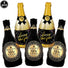 Five inflatable champagne bottles with 'Happy New Year' labels on a white background