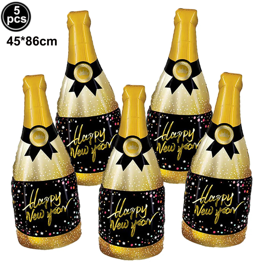 Five inflatable champagne bottle-shaped balloons with 'Happy New Year' text on a white background.