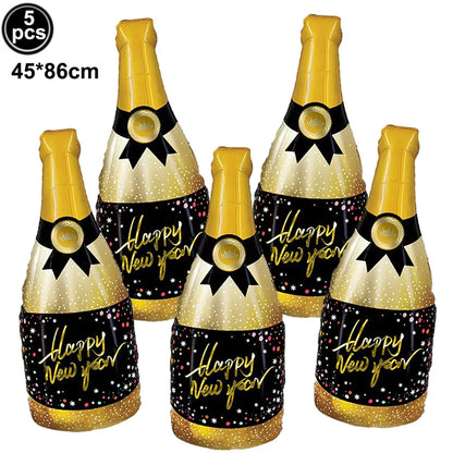 Five inflatable champagne bottle-shaped balloons with 'Happy New Year' text on a white background.