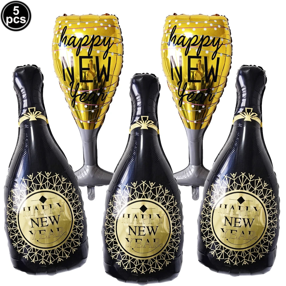 Inflatable New Year's Eve items including bottles and glasses with 'Happy New Year' text on a white background.