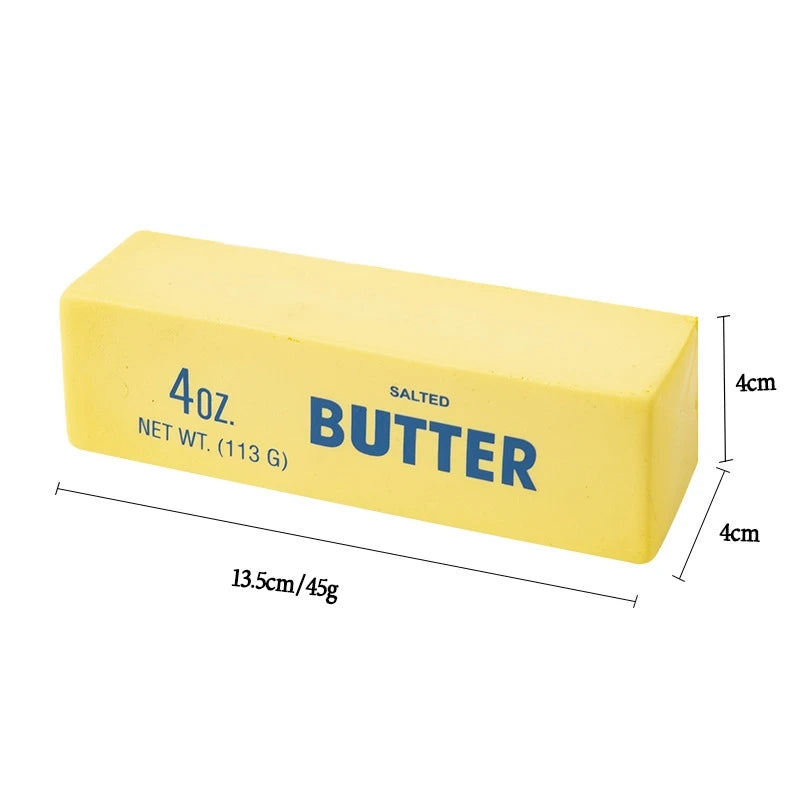 Yellow block of butter toy with blue text on a white background with dimensions