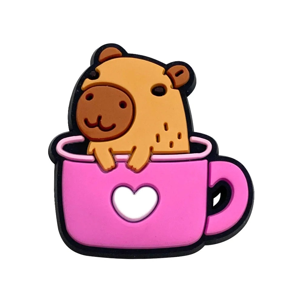 Pink mug with a cartoon capybara inside on a white background