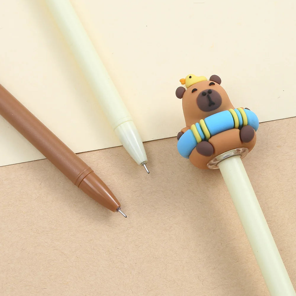 Capybara with duck and rubber ring pen