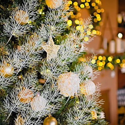 Decorated Christmas tree with ornaments and lights, blurred background