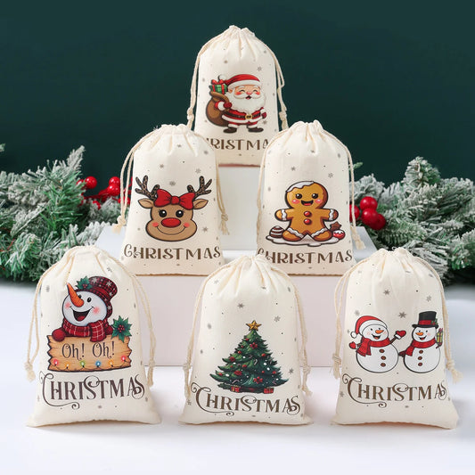 Set of Christmas-themed drawstring bags with festive designs on a white surface.