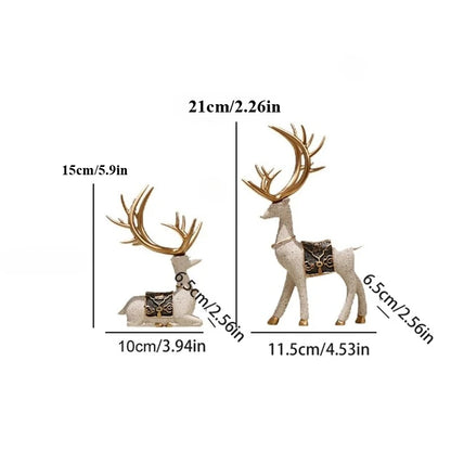 Measurement chart of two deer figurines with dimensions labeled.Cream Elk Ornaments