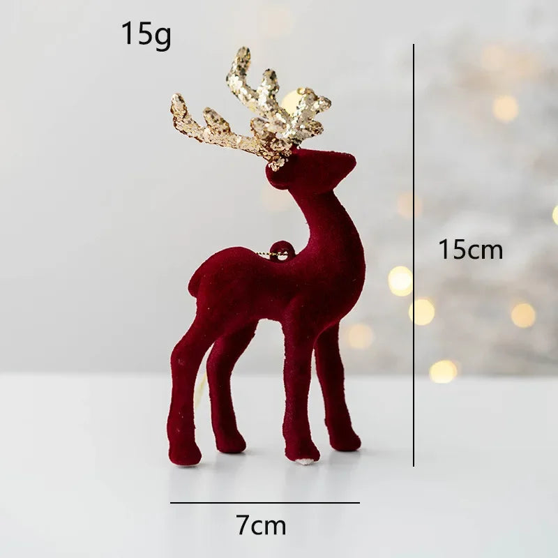 Red deer figurine with gold antlers on a light gray background, showing measurements.