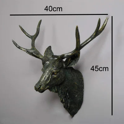 Antique Silver deer head sculpture with measurements on a white background
