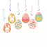 Colorful Easter egg-shaped hanging decorations with bunny, chick, and floral designs on a white background.