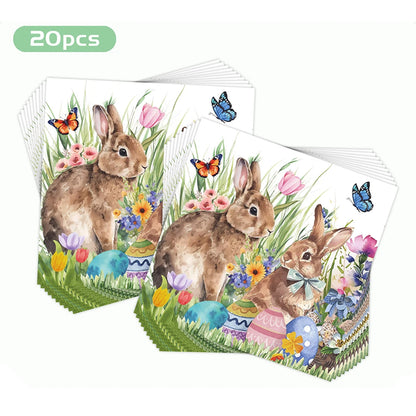 Easter-themed paper napkins with bunnies and eggs on a white background