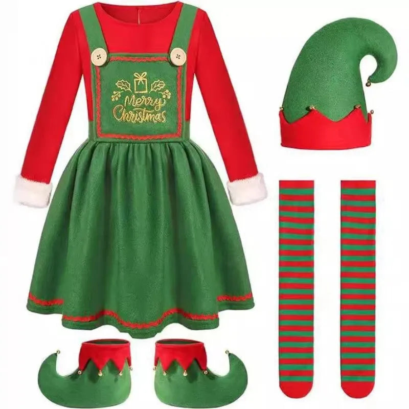 A Womens Christmas elf costume set displayed on a plain white background, including a green and red dress with a 'Merry Christmas' chest panel, a green pointed elf hat with red trim, striped green and red socks, and matching green-and-red pointed shoes.