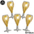 Five gold and silver inflatable champagne glass balloons on a white background.