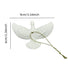 White dove-shaped decorative item with measurements on a white background