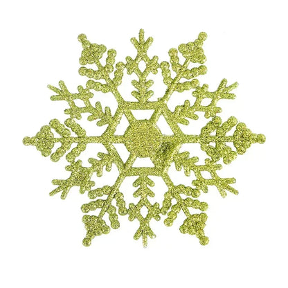 Green glittery snowflake on a white background