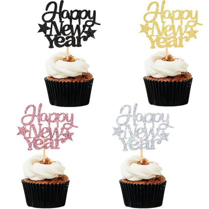 Four cupcakes with 'Happy New Year' toppers in black, gold, pink, and silver on a white background.