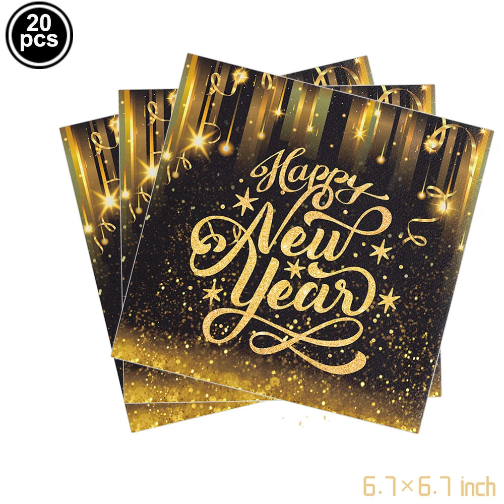 Pack of 'Happy New Year' napkins with gold text and decorative elements on a black background.
