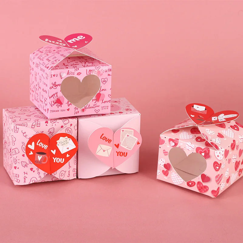 Heart-themed gift boxes with love messages on a pink background