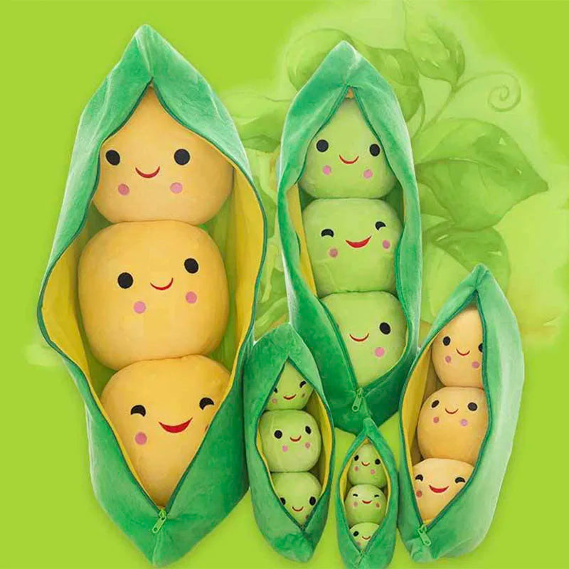 Plush toys shaped like peas in a pod with smiling faces on a green background