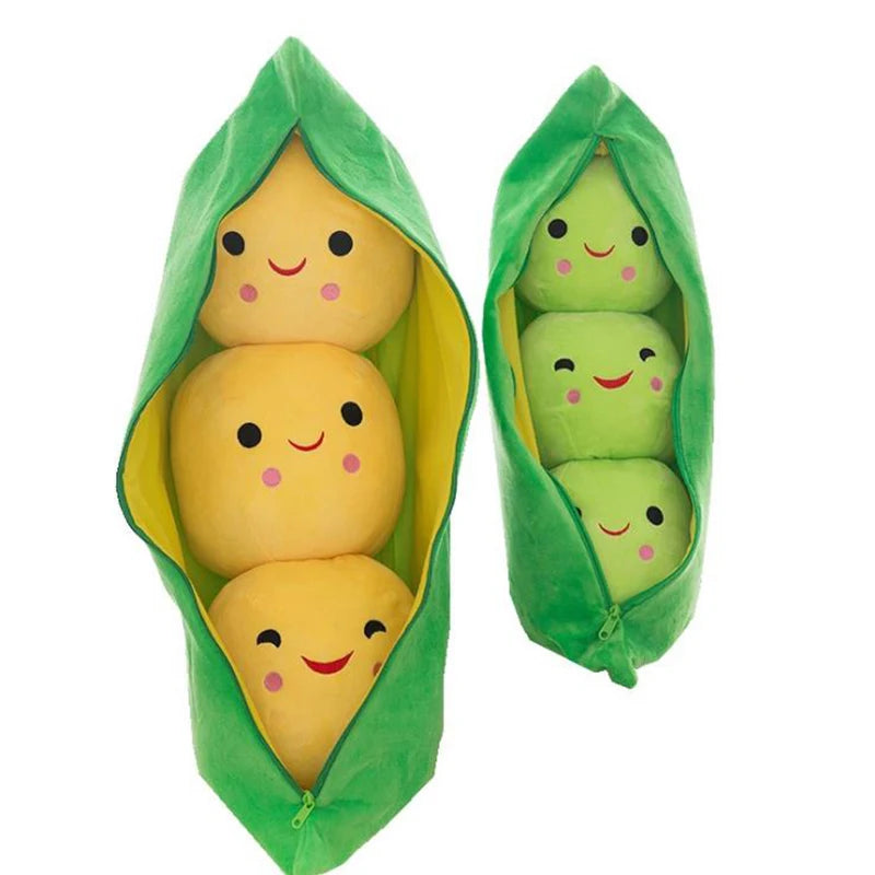 Plush toys shaped like peas in a pod with smiling faces on a white background