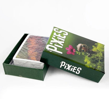 Open green box with 'Pixies' branding and playing cards inside on a white background