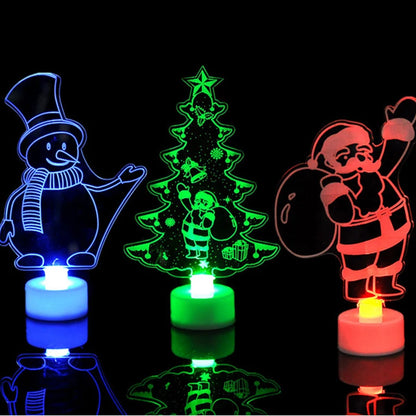Three colorful LED lights shaped like a snowman, Christmas tree, and Santa Claus on a black background.