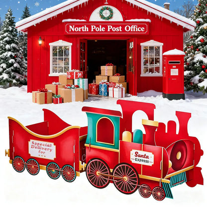 Red North Pole Train Gift Holdere Set Post Office with a toy train in front, surrounded by snow and Christmas trees.