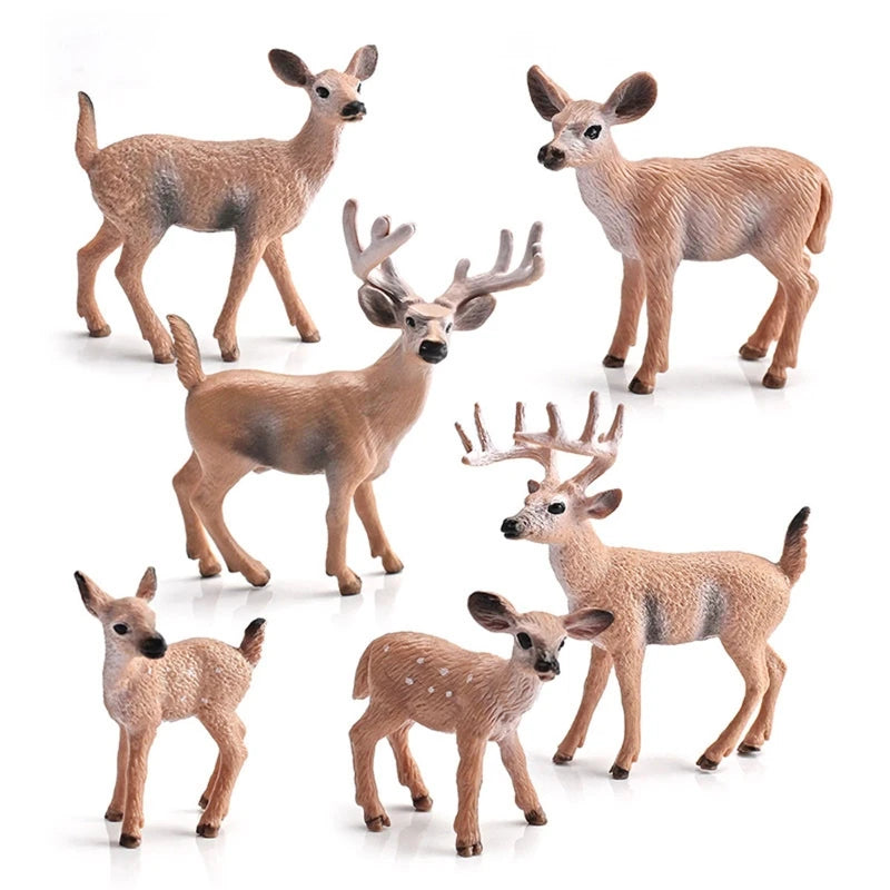 Set of seven realistic deer and fawn toy figurines in various sizes, displayed on a clean white background.