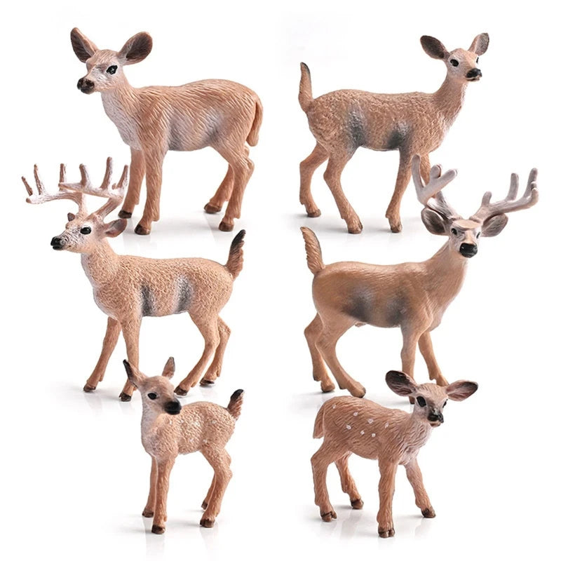 Set of seven realistic deer toy figurines in various sizes and breeds, including fawns and antlered deer, displayed on a clean white background.