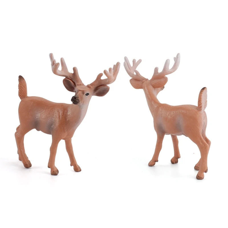 Two small deer figurines with antlers, shown standing side by side on a plain white background.