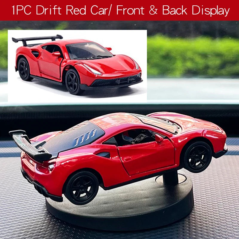 Red Drift Car Dashboard Accessories gift for menoy car displayed from front and back on a reflective surface with blurred greenery in the background.
