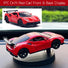 Red Drift Car Dashboard Accessories gift for menoy car displayed from front and back on a reflective surface with blurred greenery in the background.