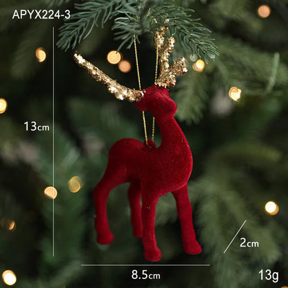 Red deer ornament with gold antlers on a Christmas tree, showing measurements.