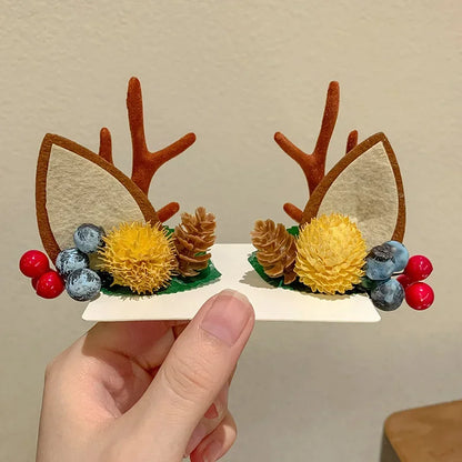 Reindeer ears clips with yellow flower acorn and berries
