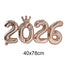 Rose gold '2026' balloon with a crown on a white background