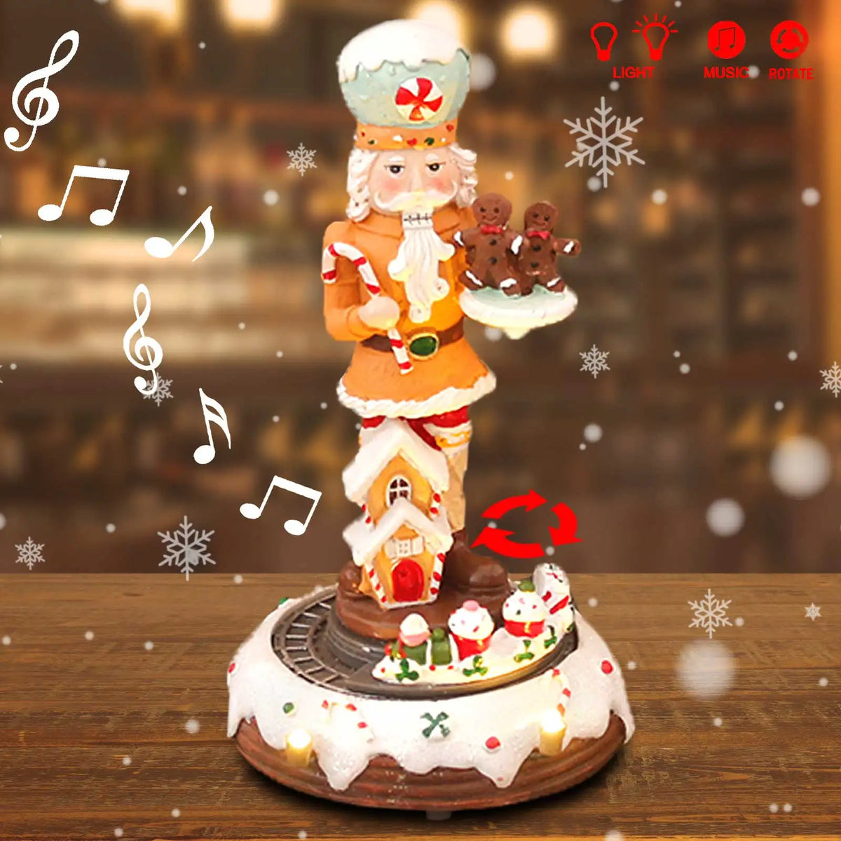 Decorative Christmas nutcracker with gingerbread house and cookies on a wooden table.