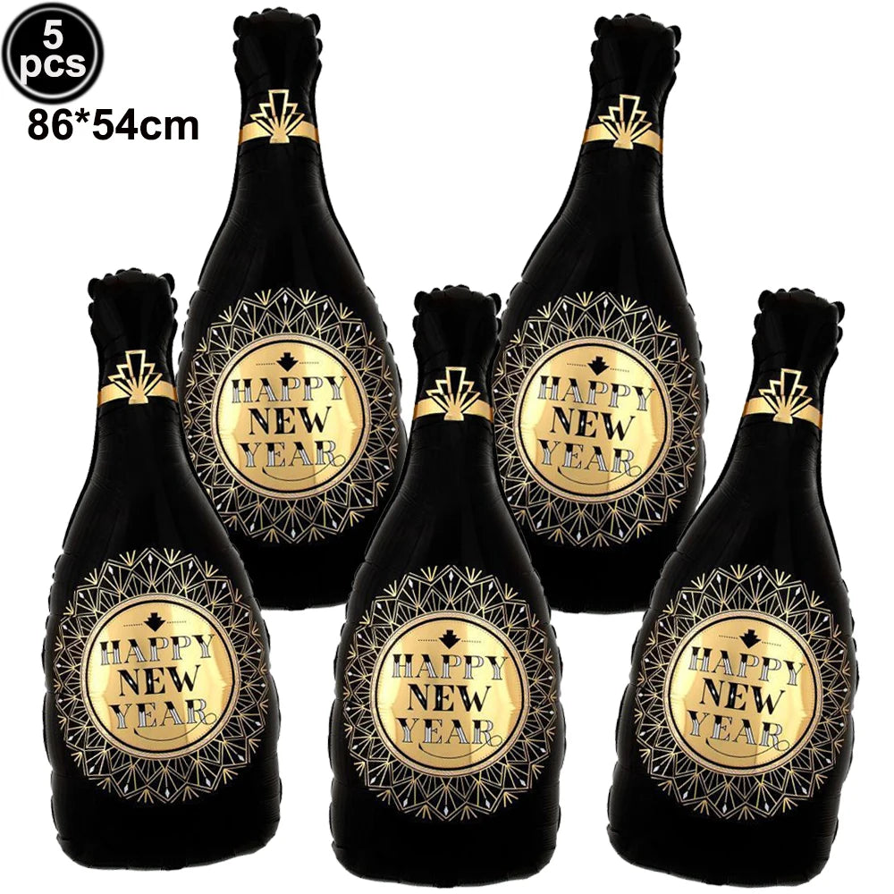 Set of five black and gold 'Happy New Year' decorative bottles on a white background