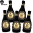 Set of five black and gold 'Happy New Year' decorative bottles on a white background