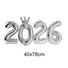 Silver '2026' balloon with a crown on a white background
